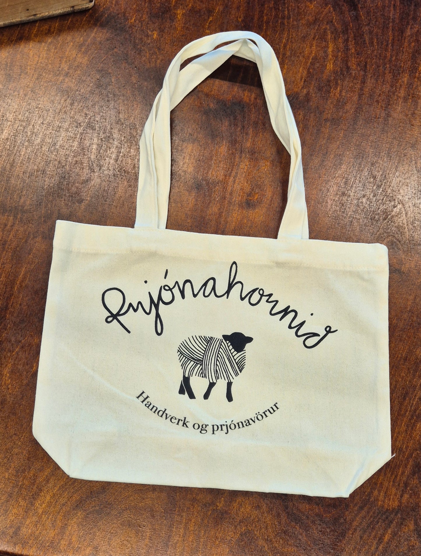 Taupokar með logo
