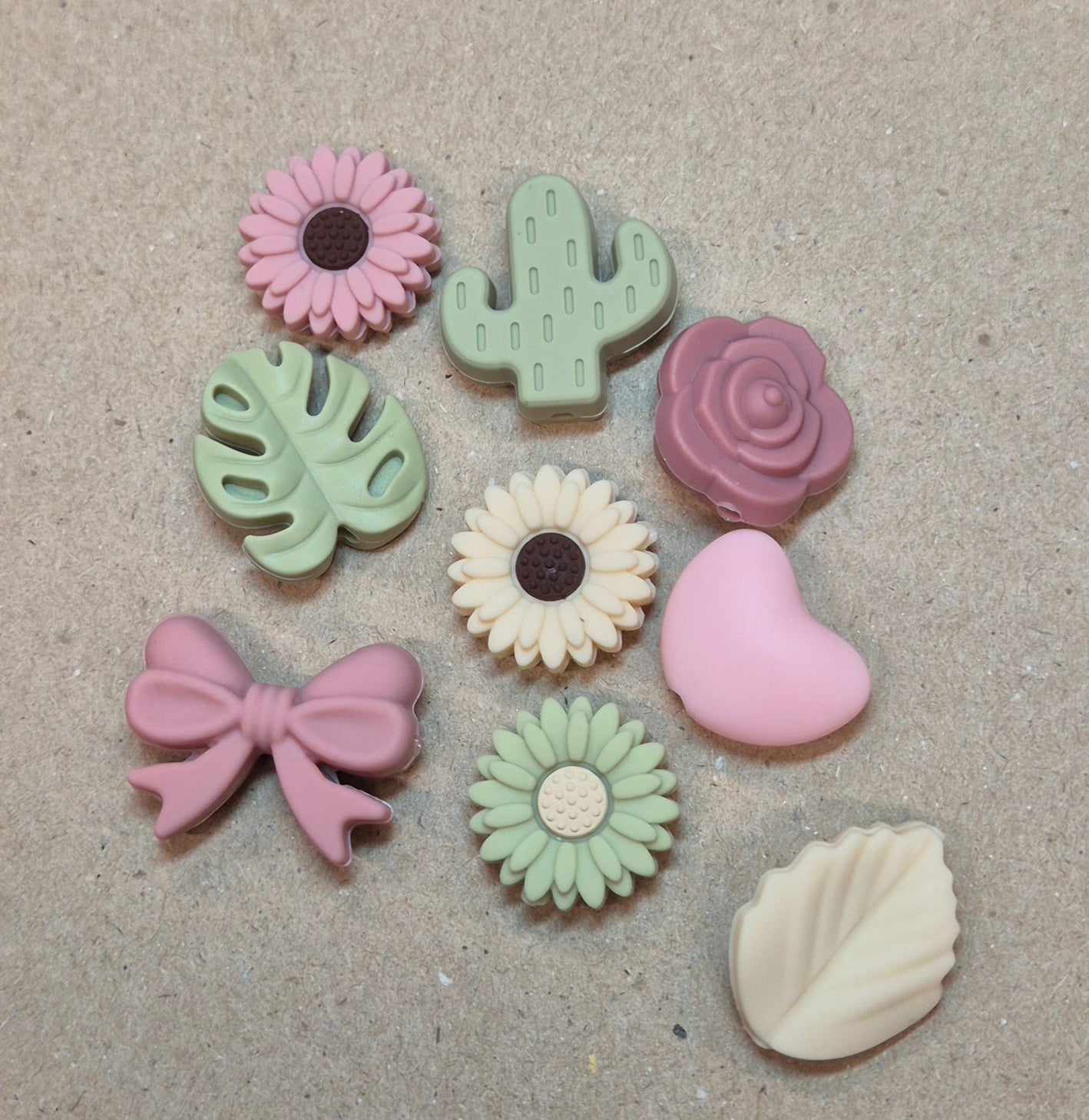 Prjónastopparar Blóm, lauf, hjörtu, kaktus og slaufur