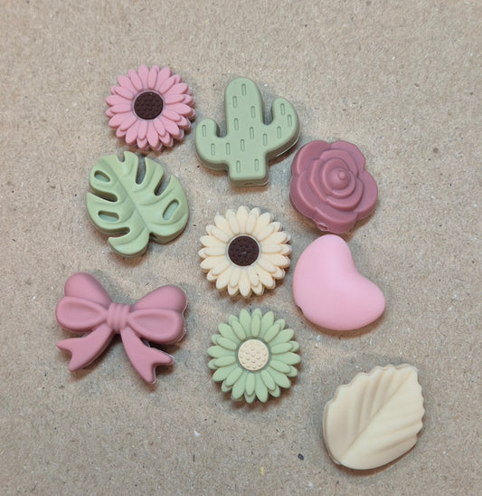 Prjónastopparar Blóm, lauf, hjörtu, kaktus og slaufur